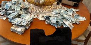 Dinheiro é jogado pela janela durante operação da PF em Balneário Camboriú